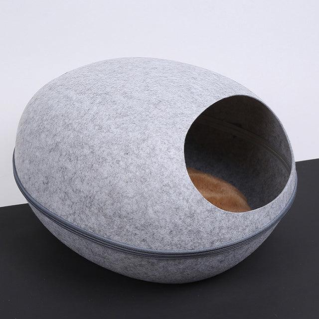 Felt cat cave bed in Light Gray, empty, with the cushion visible through the round opening