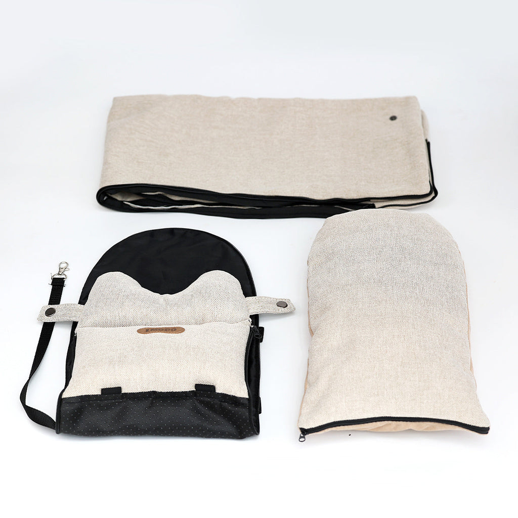Dog car seat bed in Beige taken apart: folded outer cover, removable cushion and base with clip strap