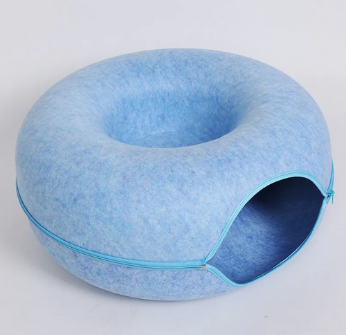 Blue felt tunnel nest for cats, a round donut-shaped hideaway with a zipper around the middle and a side opening