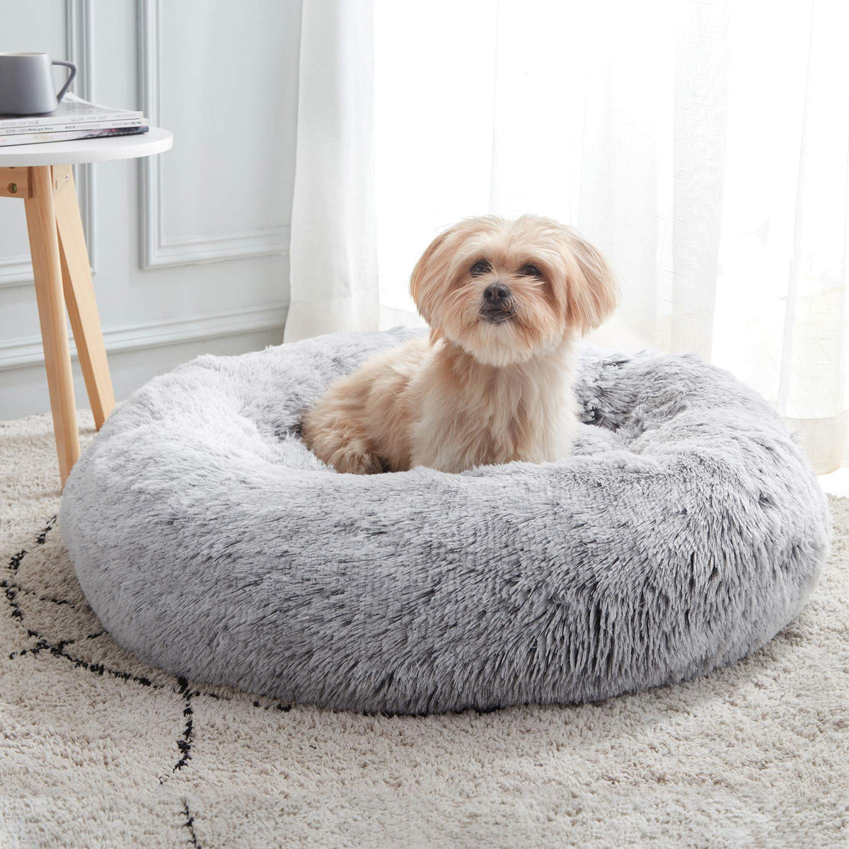 Light grey calming donut cuddler bed for dogs and cats — round faux fur pet bed with raised rim